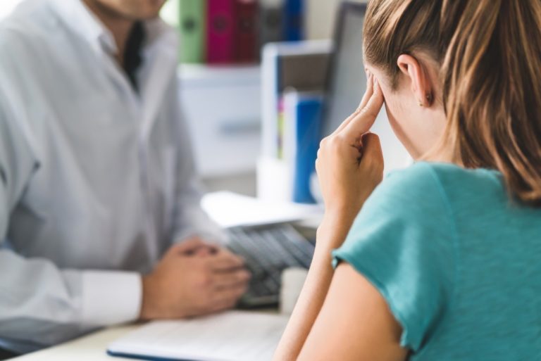 woman consulting a doctor