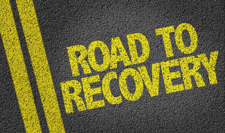 Road to recovery sign