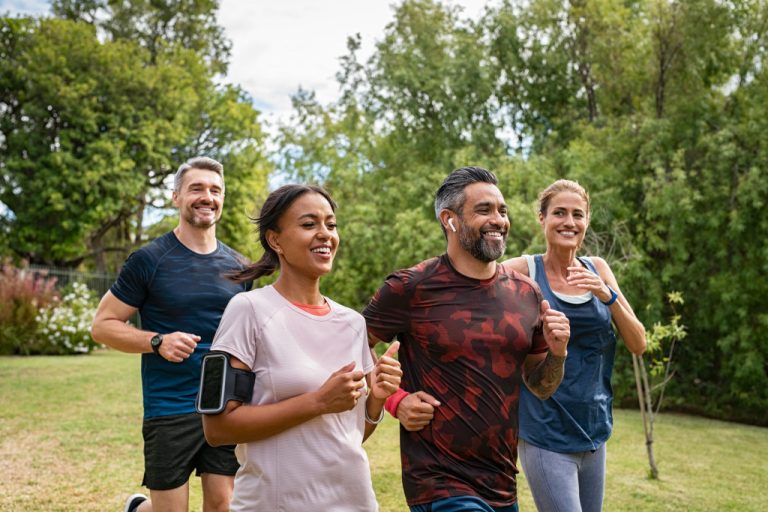 healthy multiethnic people jogging at park
